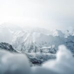 Mountain Landscapes - Breathtaking view of a snowy mountain range unde #11262381