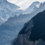 Mountain Landscapes - A breathtaking view of towering snowy peaks and #14699766