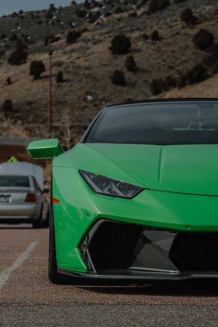 Luxury Cars - Vibrant green Lamborghini Huracan parked in a sc #16124146