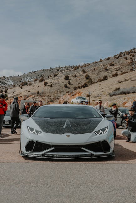 Luxury Cars - Front view of a Lamborghini Huracan with spectat #16124330