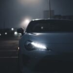 Luxury Cars - A sleek sports car with illuminated headlights i #17245109