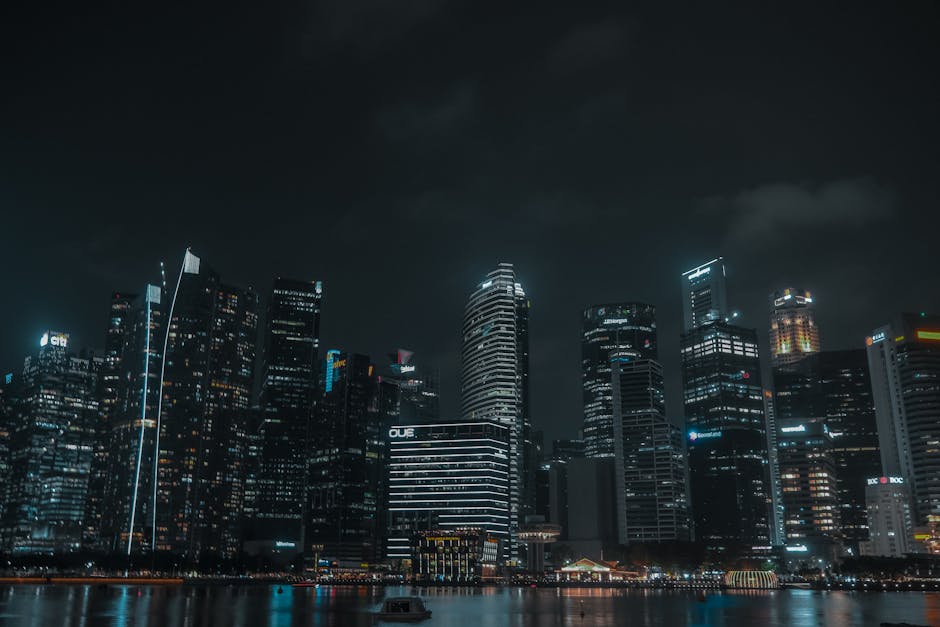 City Architecture - Dramatic view of Singapore's illuminated citysca #18095381