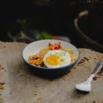 Food Aesthetics - Delicious Nasi Goreng with fried egg served on r #19834045