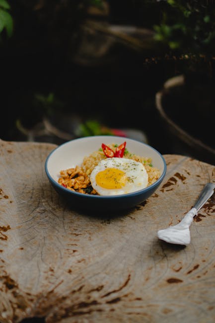 Food Aesthetics - Delicious Nasi Goreng with fried egg served on r #19834045