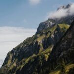 Mountain Landscapes - Stunning mountain view with lush greenery and cl #28829679