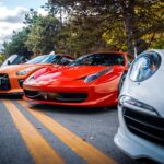Luxury Cars - Showcasing luxurious sports cars lined up on a s #30256932