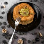 Food Aesthetics - A beautifully presented pistachio cake topped wi #31846711