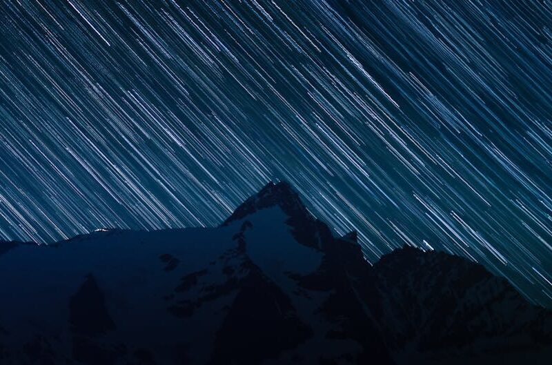 Mountain Landscapes - Captivating long exposure of star trails above s #33571214