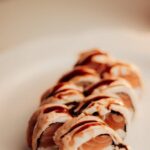 Food Aesthetics - Close-up of sushi rolls with salmon and creamy s #34303222