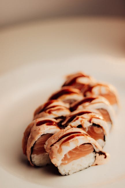 Food Aesthetics - Close-up of sushi rolls with salmon and creamy s #34303222