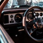 Luxury Cars - Interior view of a vintage car showcasing the cl #35528068