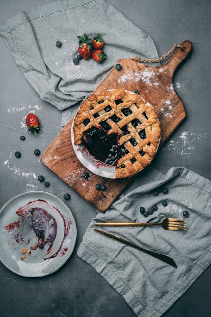 Food Aesthetics - Homemade blueberry pie on wooden board with fres #5107183