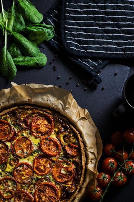 Food Aesthetics - A delicious homemade tomato quiche with fresh sp #604969