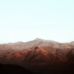 Mountain Landscapes - Captivating view of a mountain range at sunrise #7412553
